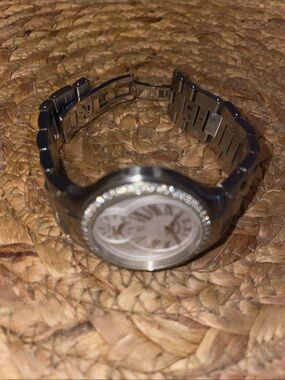 PHILIP STEIN TESLAR WOMANS WATCH 
(One diamond chip missing from band))